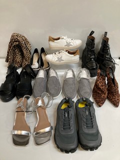 AN ASSORTMENT OF WOMENS SHOES INCLUDING NEW ROCK BOOTS