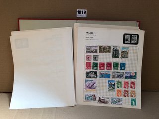 AN ALBUM OF ASSORTED VINTAGE STAMPS: LOCATION - AR8