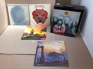 A COLLECTION OF 70S AND 80S VINYL LPS MAINLY PROG ROCK AND A RECORD CASE: LOCATION - AR8