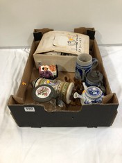 A BOX OF ANTIQUE STEINS ETC