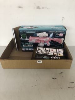 BOX OF ASSORTED ITEMS INC SPACE WATER GUN