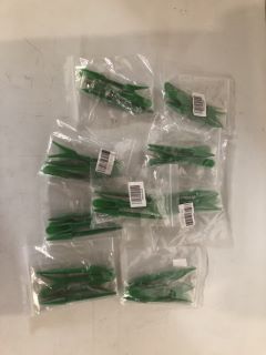 A BOX OF GREEN PLANT SPIKES