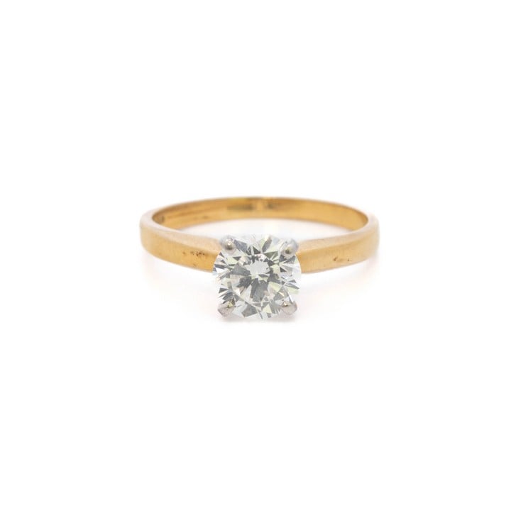 18ct Yellow and White Gold 1.20ct Diamond Round Brilliant-cut Single Stone Ring, Size O, 3.4g. Colour G-H, Clarity VS1-VS2.  Auction Guide:  £1,500-£,2000 (VAT Only Payable on Buyers Premium)