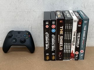 XBOX WIRELESS CONTROLLER IN BLACK TO INCLUDE QTY OF ' THE SHIELD ' DVD'S TO INCLUDE ' THE SHIELD THE COMPLETE II SEASON ' (PLEASE NOTE: 18+YEARS ONLY. ID MAY BE REQUIRED): LOCATION - B 7