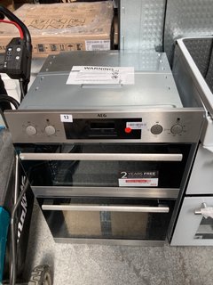 AEG BUILT IN DOUBLE ELECTRIC OVEN: MODEL DEB331010M - RRP £499: LOCATION - A4