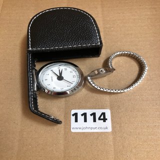 A TRAVEL ALARM CLOCK AND A LADIES VINTAGE WRIST WATCH: LOCATION - CR