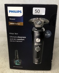 PHILIPS SHAVER SERIES 9000 PRESTIGE, WET AND DRY ELECTRIC SHAVER, BLACK MATTE, LIFT & CUT SHAVING SYSTEM, SKIN IQ TECHNOLOGY, BEARD STYLER, CLEANING POD, PREMIUM POUCH, MODEL SP9840/31.: LOCATION - A