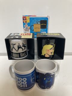 A BOX OF ASSORTED COFFEE MUGS TO INCLUDE "RUN-DMC" COFFEE MUG