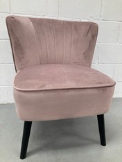 FABRIC ARMCHAIR WITH WOODEN BASE AND 4 DUSTY PINK LEGS.