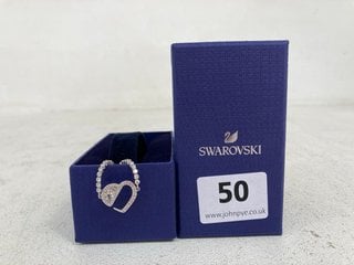 SWAROVSKI HEAR HEART BRACELET IN SILVER: LOCATION - FRONT BOOTH