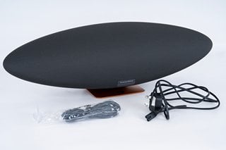 MCLAREN BOWERS & WILKINS ZEPPELIN WIRELESS SPEAKER IN GALVANIC GREY & PAPAYA ORANGE - MODEL FP44601 - RRP £799: LOCATION - BOOTH