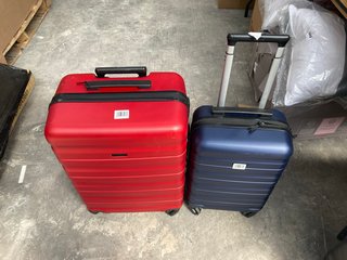 JOHN LEWIS & PARTNERS MEDIUM HARD SHELL SUITCASE IN RED TO INCLUDE HARD SHELL CABIN BAG IN NAVY: LOCATION - B7