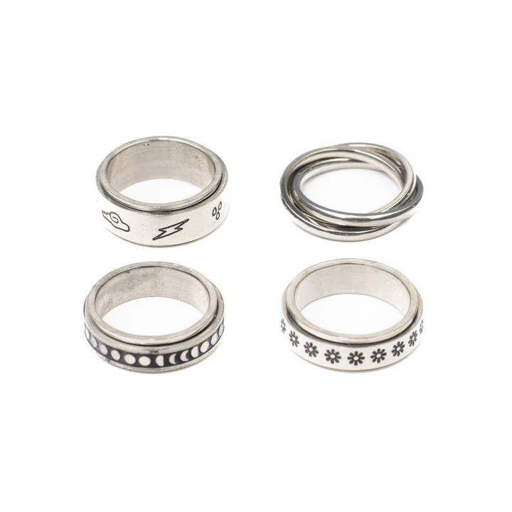 Selection of Four Metal Patterned Spinner Band Rings, Size L½, total weight 18.2g (VAT Only Payable on Buyers Premium)