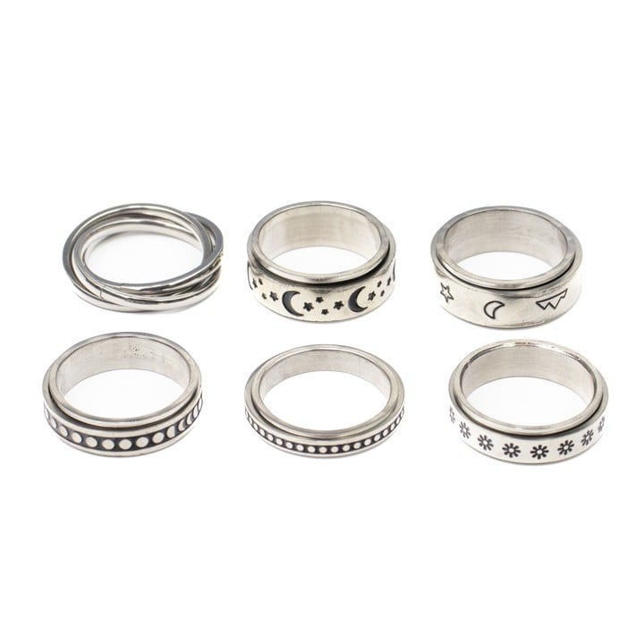 Selection of Six Metal Patterned Spinner Band Rings, Size N½, total weight 28.8g (VAT Only Payable on Buyers Premium)