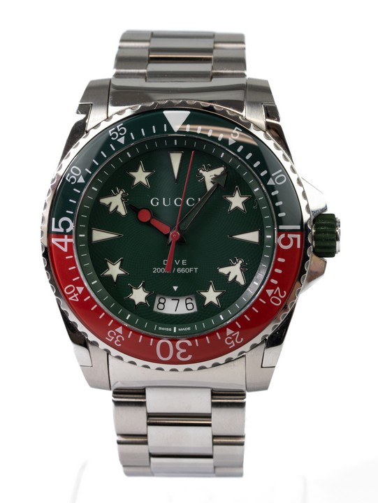 Gucci Dive Quartz Watch
Ref: 136.2
Year: Unknown
Size: 45mm
Case: Stainless Steel Case with Green & Red Stainless Steel Uni-Directional Bezel, Green Dial with Date Indicator
Bracelet: Stainless Steel