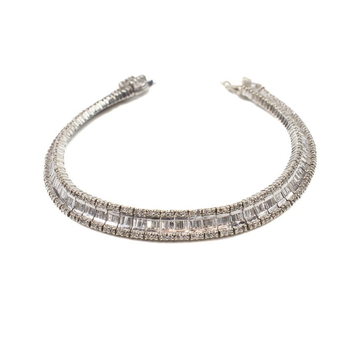 18ct White Gold 5.00ct Diamond Baguette and Round-cut Line Bracelet, 19cm, 22.6g.  Auction Guide: £1,600-£2,100 (VAT Only Payable on Buyers Premium)