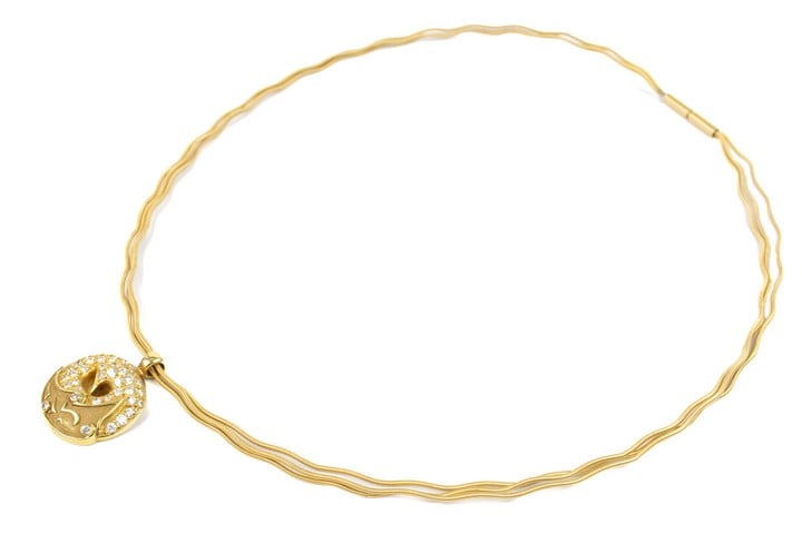 Boodles & Dunthorpe 18 Yellow Gold 0.57ct Diamond Circular Pendant and None Boodles Triple Strand Wiggle Chain, 41cm, 15.5g. (Comes With Box)  Auction Guide: £900 - £1,100 (VAT Only Payable on Buyers