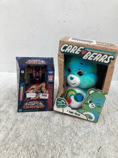 TRANSFORMER LEGACY UNITED ACTION FIGURE TO INCLUDE LOVE THE EARTH CARE BEAR PLUSH: LOCATION - C1