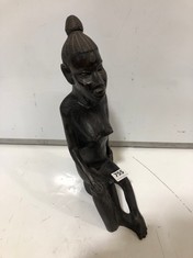 A HAND CARVED AFRICAN TEIBAL FIGURE OF A WOMAN