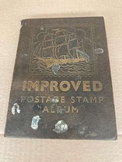 A VINTAGE STAMP ALBUM AND CONTENTS: LOCATION - CR