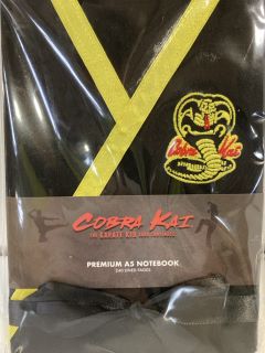 BOX OF ASSORTED ITEMS TO INCLUDE COBRA KAI THE KARATE KID PREMIUM A5 NOTEBOOK