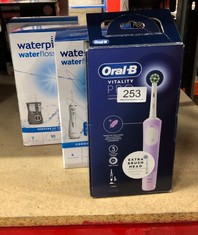 QUANTITY OF ITEMS TO INCLUDE ORAL-B VITALITY PRO ELECTRIC TOOTHBRUSH FOR ADULTS, 1 HANDLE, 2 TOOTHBRUSH HEADS, 3 BRUSHING MODES INCLUDING SENSITIVE PLUS, 2 PIN UK PLUG, PURPLE: LOCATION - B RACK