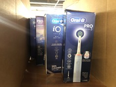 QUANTITY OF ITEMS TO INCLUDE ORAL-B PRO SERIES 3 ELETRIC TOOTHBRUSH : LOCATION - FRONT TABLES