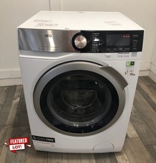 AEG 9000 SERIES LAVAMAT FREESTANDING WASHING MACHINE MODEL L9FEC966R RRP £999: LOCATION - FRONT FLOOR(COLLECTION OR OPTIONAL DELIVERY AVAILABLE)