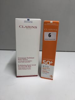 2 X CLARINS BEAUTY PRODUCTS, SUN CARE LOTION SPRAY AND EXFOLIATING BODY SCRUB