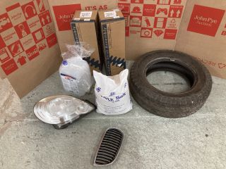 SELECTION OF CAR PARTS TO INCLUDE 4X4 TYRE HEADLIGHT ADBLUE AND A PAIR OF MAZDA 3/5 FRONT SHOCK ABSORBERS