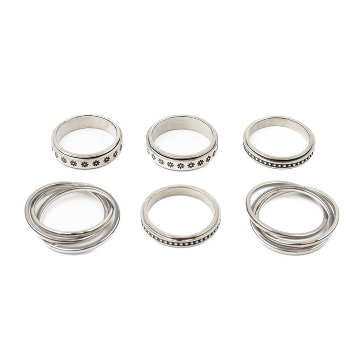 Selection of Six Metal Patterned Spinner Band Rings, Size V½, total weight 29g (VAT Only Payable on Buyers Premium)