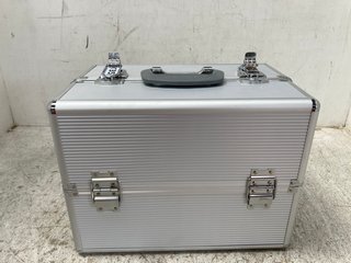 LARGE METAL STACKED MAKE-UP BOX IN SILVER: LOCATION - C1