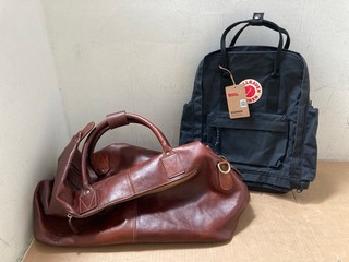 2 X ASSORTED BAGS TO INCLUDE FJALLRAVEN KANKEN OUTLONG BACKPACK IN BLACK AND JOHN LEWIS AND PARTNERS LEATHER HAND CARRY BAG IN BROWN: LOCATION - AR14