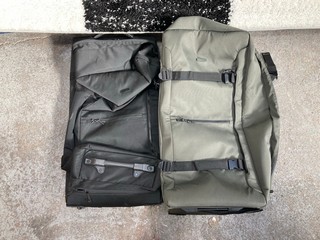 2 X JOHN LEWIS AND PARTNERS DAKAR DUFFLE 67CM 2-WHEEL MEDIUM SUITCASES IN BLACK AND KHAKI GREEN RRP £99 EACH: LOCATION - AR14