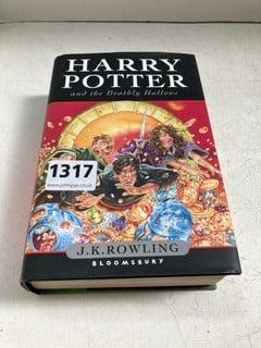 J.K. ROWLING FIRST EDITION HARDBACK BOOK WITH DUST WRAPPER, "HARRY POTTER AND THE DEATHLY HALLOWS": LOCATION - AR17