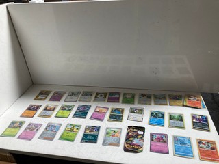 30+ HOLOGRAPHIC POKEMON CARDS: LOCATION - AR17