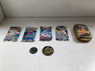 A TRAINERS TIN OF POKEMON CARDS: LOCATION - AR17