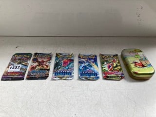 A TRAINERS TIN OF POKEMON CARDS: LOCATION - AR17