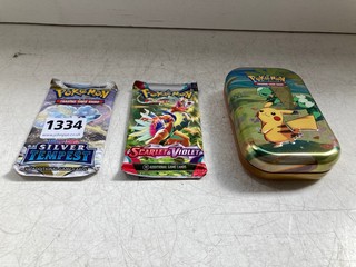 A TRAINERS TIN OF POKEMON CARDS: LOCATION - AR17