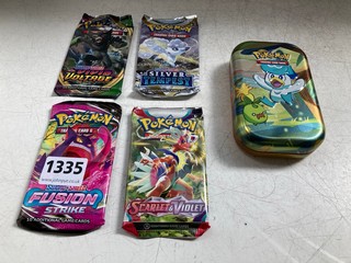 A TRAINERS TIN OF POKEMON CARDS: LOCATION - AR17