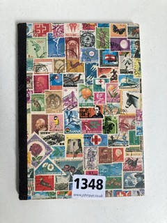 A STOCK BOOK OF ASSORTED VINTAGE STAMPS: LOCATION - AR17