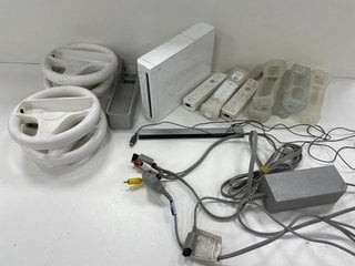 NINTENDO WII GAMES CONSOLE: MODEL NO RVL-001(EUR, WITH POWER ADAPTER, 2X WII REMOTES, 5X NUN CHUCKS, SENSOR BAR, DISPLAY CABLE & 4X CONTROLLER WHEELS) [JPTM121775]