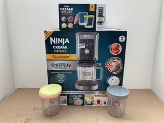 NINJA CREAMI DELUXE 10 - IN - 1 ICE CREAM AND FROZEN DRINK MAKER TO INCLUDE NINJA CREAMI DELUXE 24 OZ. PINTS & LIDS: LOCATION - D 8