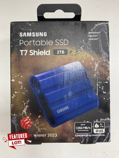 SAMSUNG T7 SHIELD PORTABLE SSD 2 TB - USB 3.2 GEN.2 EXTERNAL SSD EXTERNAL STORAGE DEVICE (ORIGINAL RRP - £159) IN BLUE: MODEL NO MU-PE2T0R (WITH BOX) [JPTM121507] THIS PRODUCT IS FULLY FUNCTIONAL AND