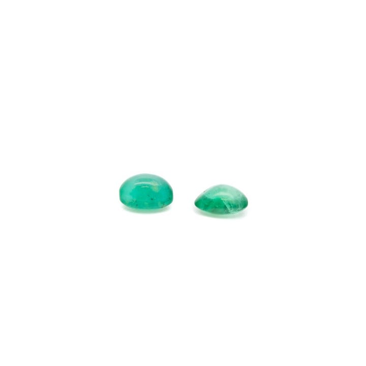 1.30ct Columbian Emerald Cabochon Oval-cut Pair of Gemstones.  Auction Guide: £150-£200 (VAT Only Payable on Buyers Premium)