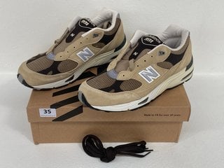 NEW BALANCE 991V1 FINALE TRAINERS IN BROWN - UK SIZE 9.5 - RRP £199.99: LOCATION - FRONT BOOTH