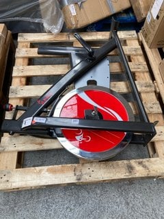 SUNNY EXERCISE BIKE IN BLACK RED & SILVER (MISSING SEAT & HANDLE BARS): LOCATION - A4 (KERBSIDE PALLET DELIVERY)