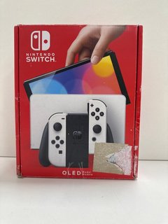 NINTENDO SWITCH OLED 64GB GAMES CONSOLE IN WHITE: MODEL NO HEG-001 (WITH BOX & ALL ACCESSORIES) [JPTM121947]. THIS PRODUCT IS FULLY FUNCTIONAL AND IS PART OF OUR PREMIUM TECH AND ELECTRONICS RANGE