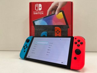 NINTENDO SWITCH OLED MODEL 64 GB GAMES CONSOLE IN NEON BLUE / NEON RED: MODEL NO HEG-001 (WITH BOX & ALL ACCESSORIES) [JPTM121863]. THIS PRODUCT IS FULLY FUNCTIONAL AND IS PART OF OUR PREMIUM TECH AN