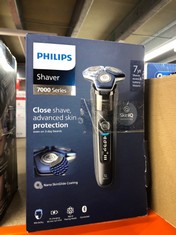 PHILIPS SHAVER SERIES 7000 - WET & DRY MEN'S ELECTRIC SHAVER WITH SKIN IQ TECHNOLOGY, POP-UP TRIMMER, CHARGING STAND, TRAVEL CASE AND CLEANING BRUSH (MODEL S7887/35).: LOCATION - B